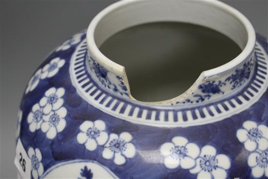 A 19th century Chinese blue and white jar, with panelled decoration, height 28cm and an associated vase lid